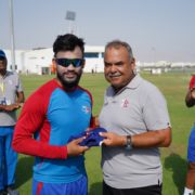 Kushal Bhurtel receiving Debut Cap from Dav Whatmore